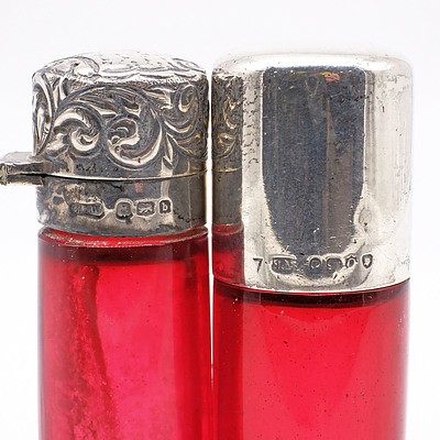 Two Hallmarked Victorian Sterling Silver Topped Ruby Glass Scent Bottles, London 1889 and Birmingham 1901