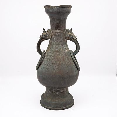 DESCRIPTION UPDATE Antique Chinese Bronze Vase the Pear Shape Body with Archaistic Style Decoration and Dragon Handles Above a Foot Cast with Waves, Ming Dynasty