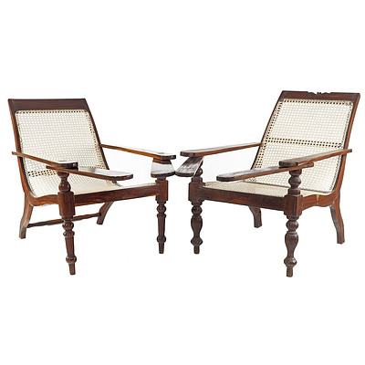 Near Pair Antique Sri Lankan/Dutch East Indies Caned Nadun Wood Plantation Chairs with Ebony Dot Inlay to the Crest of One