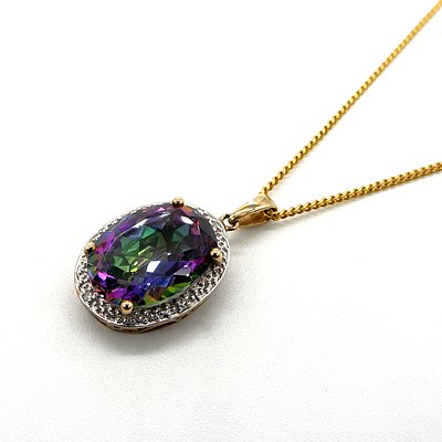 9ct Yellow Gold Pendant with a Oval Facetted Rainbow Topaz and Four Single Cut Diamonds