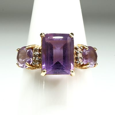 10ct Yellow Gold Ring with Three Pale Amethyst and Six Round Brilliant Cut Diamonds, 2g