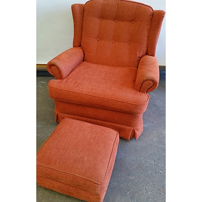 Upholstered Orange Armchair and Footstool