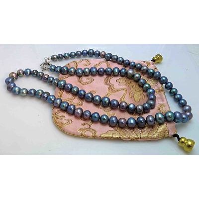 Necklace Of Peacock Black Pearls