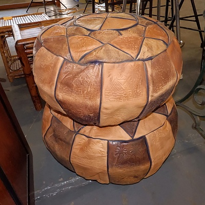 Two Sub-Continental Impressed Leather Poufs