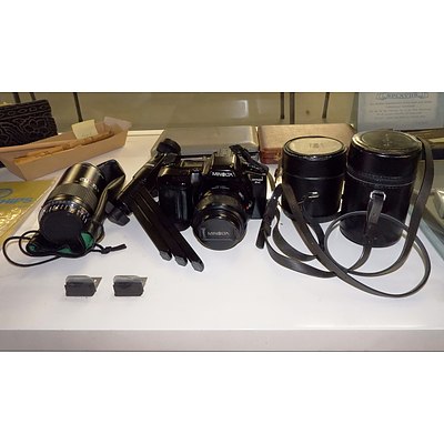 Minolta Maxxum Dynax 3xi 35 mm Film SLR Camera, Three Lenses and a Polaroid Portable Table Tripod