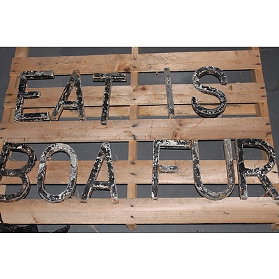 Eleven Vintage Industrial Solid Iron Letters