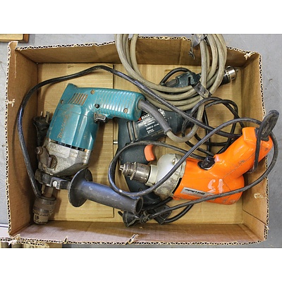 One Makita and Two Black and Decker Electric Drills