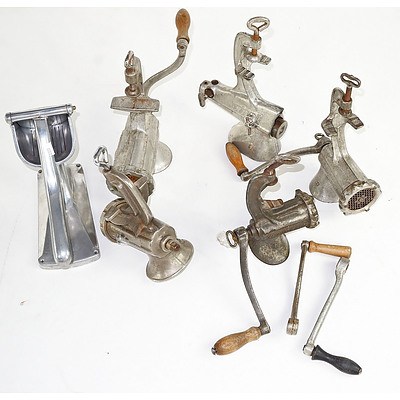 Five Vintage Bench Mounted Meat Grinders and a Juicer