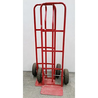 Two Red Hand Trolleys