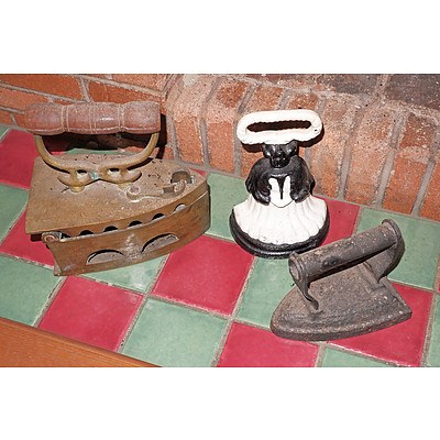 Two Antique Irons and a Cast Iron Door Stop