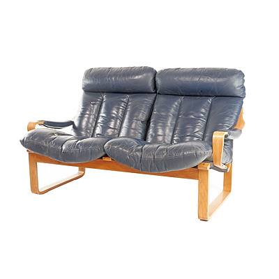 Tessa Navy Leather Upholstered Two Seater Lounge Designed by Fred Lowen
