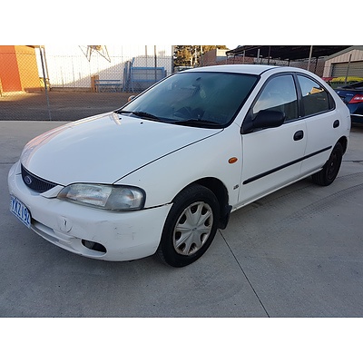 1/1997 Ford Laser LXi Liata KJII - Lot 1141220 | CARBIDS