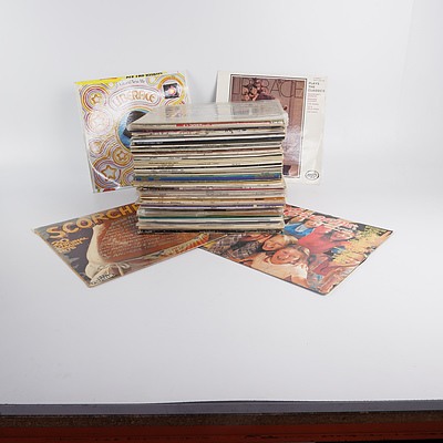 Quantity of Approximately 50 Vinyl 12 Inch LP Records Including Liberace, Dragon and More