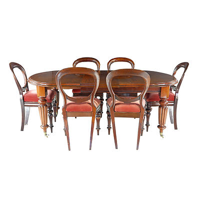 Victorian Mahogany Fluted Leg Extension Dining Table and Six Ballon Back Chairs Circa 1880