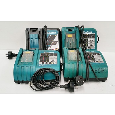 Three Makita DC18RA Battery Chargers and One Makita DC18RC Battery Charger