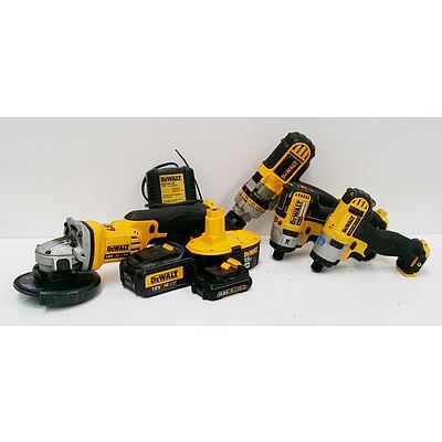 Group of Four DeWalt Power Tools With Batteries and Charger