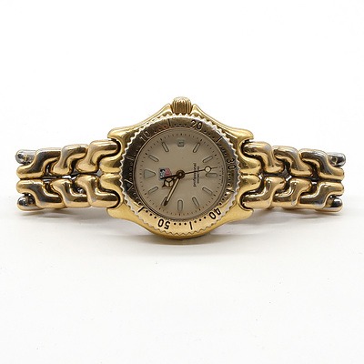 Ladies Tag Heuer Professional Quartz Date Wristwatch with Gold Plated Band, Model: S94.015
