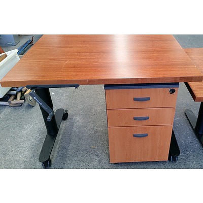Two Maple Veneer Height Adjustable Desks and Pedestal Drawer Unit