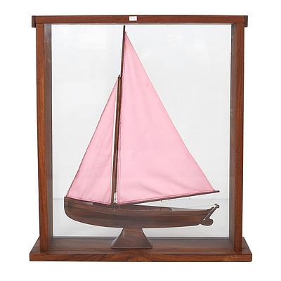 Nicely Carved Hardwood Model Pond Yacht in Display Case, Pink Sails